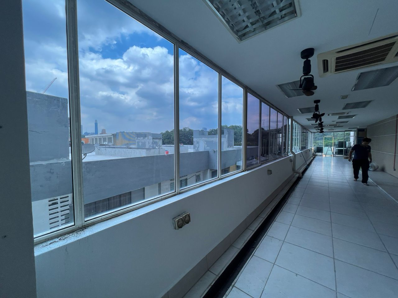 Commercial corridor with floor-to-ceiling window film installation